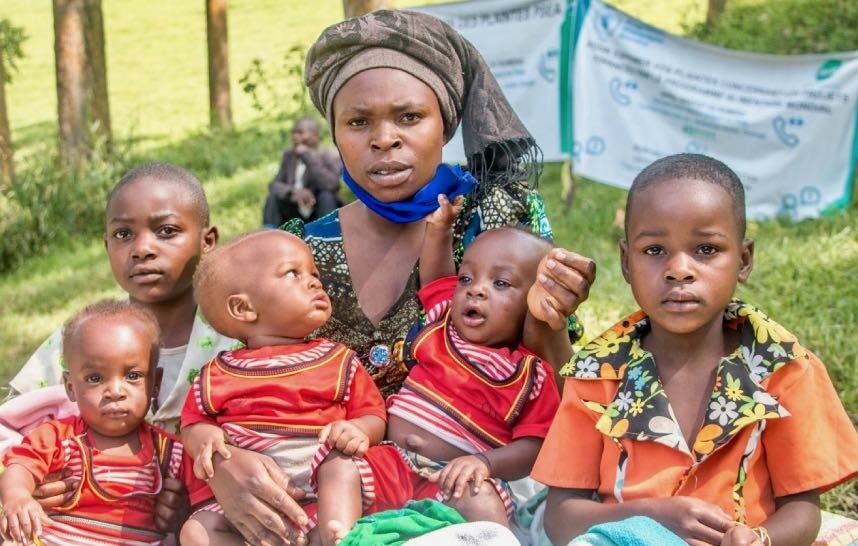 Pendeza with some of her large - and hungry - family in their new home in northeastern DRC. Photo: WFP/Benjamin Anguandia
